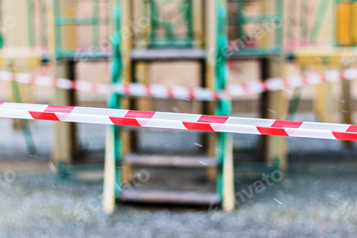 Preview: Closed playground during quarantine 2020. warning tape pulled around.Coronavirus Pandemic.