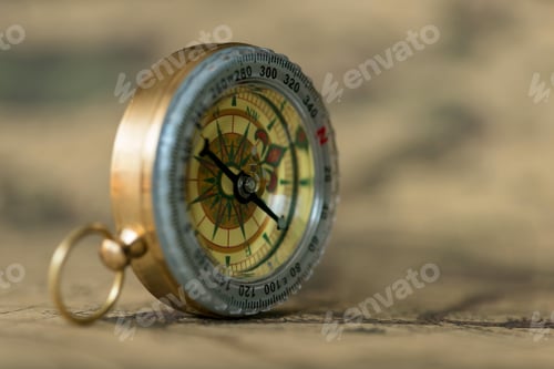 Preview: Old compass on vintage map