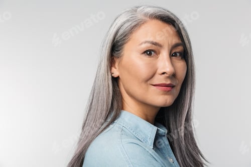 Preview: Image of adult mature woman with long white hair looking at camera