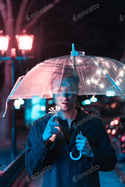 Preview: Guy under an umbrella