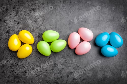 Preview: Colorful Easter Eggs Arranged on a Gray Background