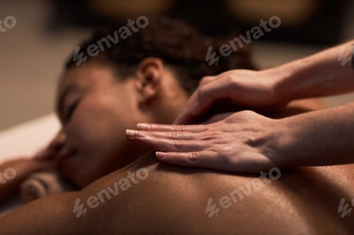 Preview: Massaging Neck of Female Client