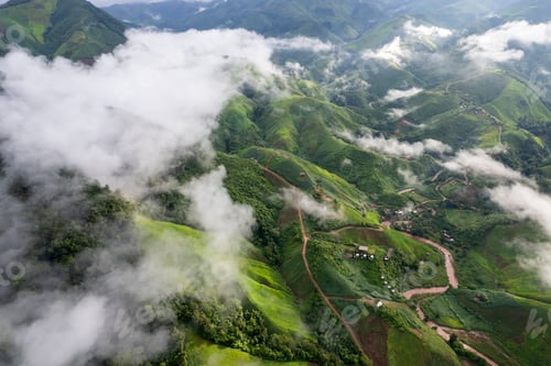 Preview: Landscape of Morning Mist with Mountain Layer. mountain ridge and clouds in rural jungle bush forest