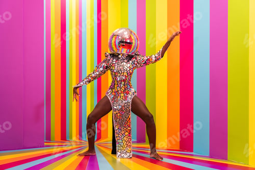Preview: Beautiful young woman dancing and having fun inside a rainbow box room