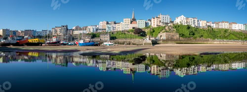 Preview: UK, Wales, Pembrokeshire, Tenby, panoramic view of harbour, low tide, water reflection