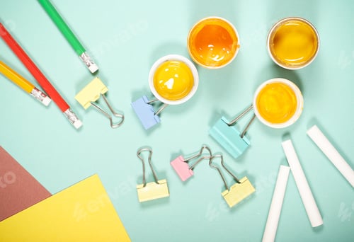 Preview: Goods For Creativity And School Lie On A Bright Background Near School Black Board