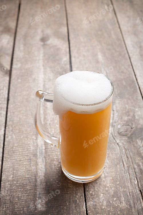 Preview: glass beer on wood background