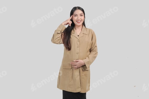 Preview: Smiling Woman in Tan Coat Points to Head