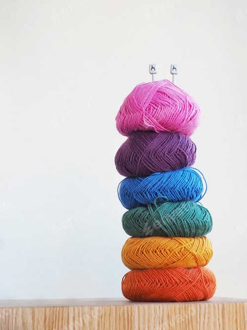 Preview: Skeins of yarn for knitting on a white background