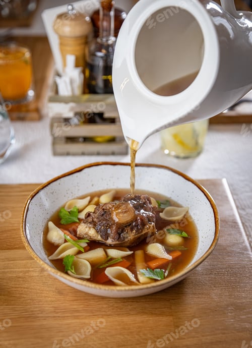 Preview: Oxtail soup being served in a restaurant