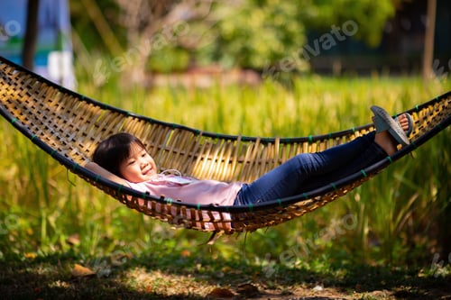 Preview: Relaxing kid on a swing