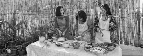 Preview: Asian family cooking together at home patio outdoor