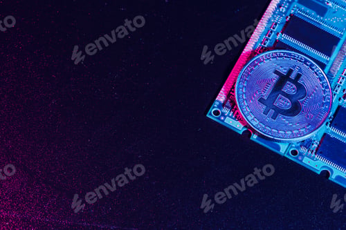 Preview: golden bitcoin and computer chip in background