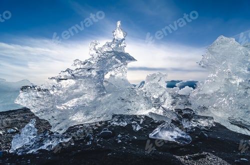 Preview: black beach with pieces of ice