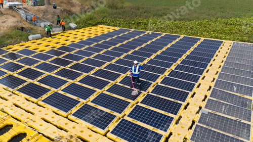 Preview: Renewable Energy Eco Technology Electric Power. Floating solar panels on lake.
