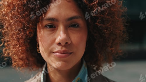 Preview: Close-Up Portrait Of Woman With Curly Hair