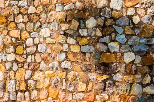 Vista previa: Fondo de pared de piedra antigua.