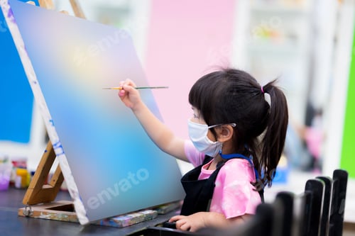 Preview: Student baby learn art and paint in watercolor in class. Girls wear mask while in class.