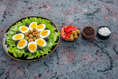Preview: front view egg salad with tomatoes and olives on light background health tea bread meal morning