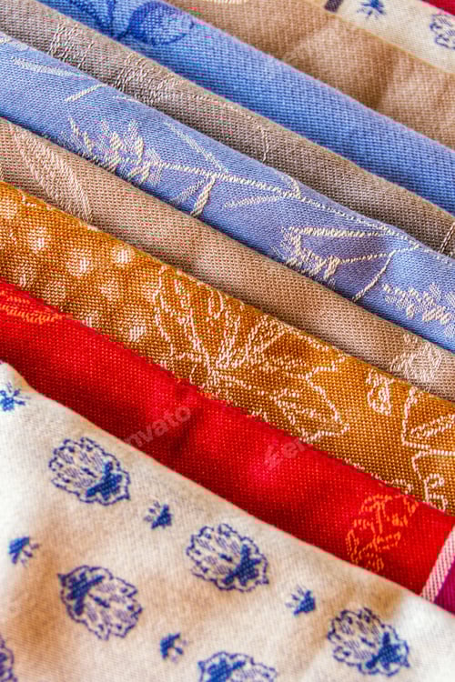 Preview: Abstract Close-Up of Colorful Fabrics with Floral Designs