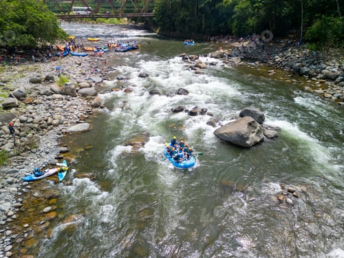 Preview: Aerial view of people rafting and kayaking in Sarapiqui River, Costa Rica