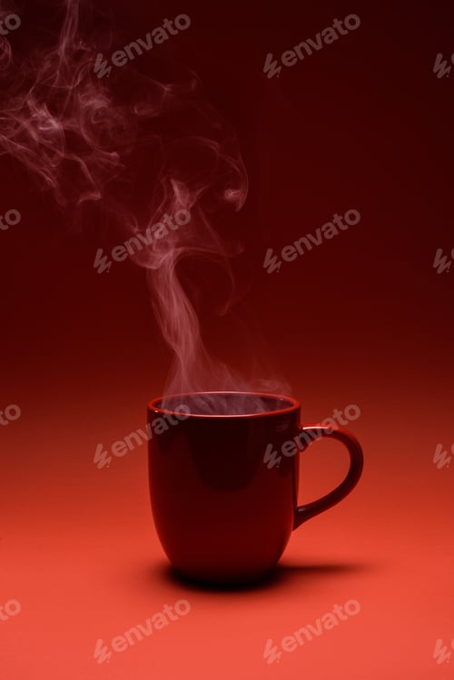 Preview: close up view of red cup of coffee isolated on red