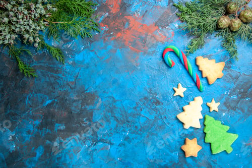 Preview: top view little tree figures on blue background color christmas holiday photo new year free space