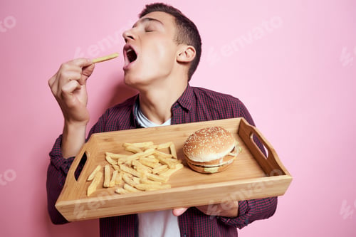Preview: man in shirt eating hamburger snack restaurant
