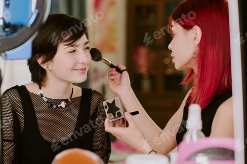 Preview: Applying Makeup on Smiling Friend Using Brush and Palette