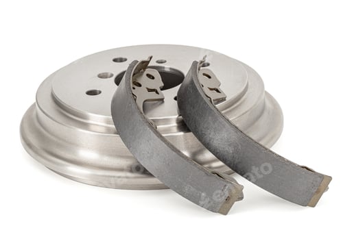 Preview: Asbestos brake pads and drum, replacement spare parts of the car brake system, isolated on white