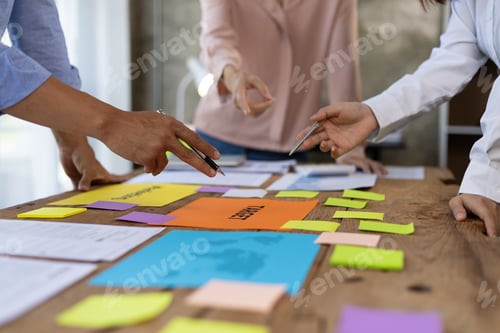 Preview: Meeting colleagues is discussing marketing strategy analysis and planning to achieve business goals.