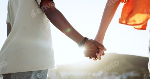 Preview: Interracial couple, bonding or holding hands in support, trust or security in Lisbon city, Portugal