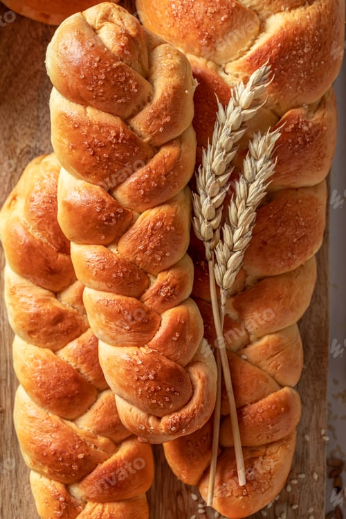 Preview: Multigrain and homemade loaf of breads with ears and grain.