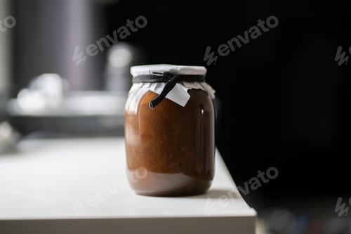 Preview: a single jar with jam at home on the shelf, homemade food