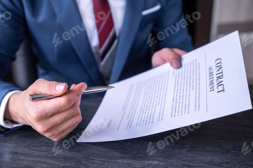 Preview: business man reading and signing a business contract, business agreement consensus signing, business