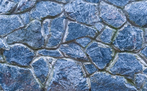 Preview: background of a wall of blue stones.