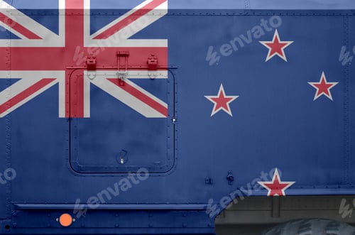 Preview: New Zealand flag depicted on side part of military armored truck close up