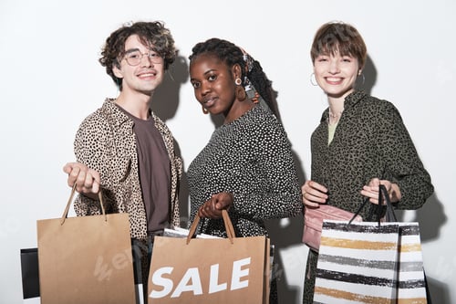 Preview: Young people with shopping bags