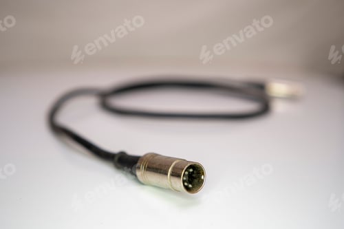 Preview: Closeup of the Musical Instruments Digital Interface cable. Selected focus.