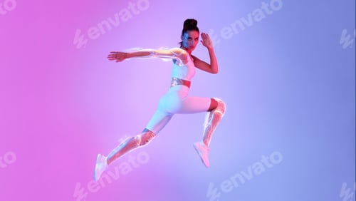 Preview: Athletic Woman Jumping In Mid-Air Over Pink And Blue Background