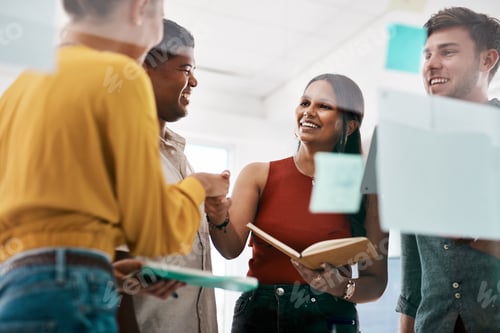 Preview: Shot of businesspeople shaking hands during a meeting in an office