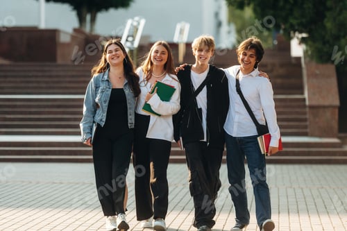 Preview: Having a break, walking. Group of students are near university together