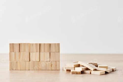 Preview: Wall made of wooden blocks on the white background. Finishing task concept