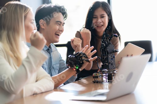 Preview: Young students researching inventions with modern technology