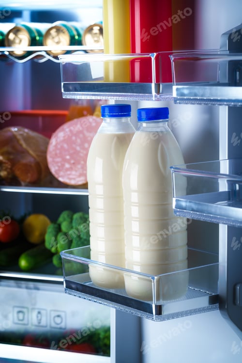Preview: Bottles of milk in the fridge