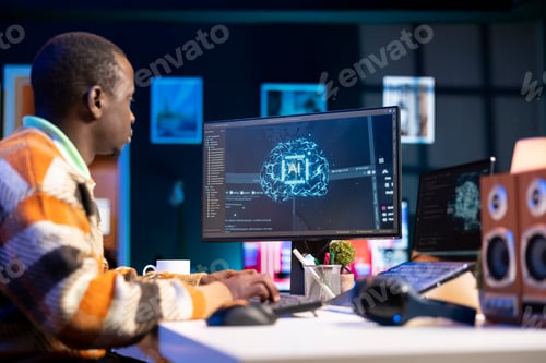 Preview: African american IT professional managing AI system for machine learning