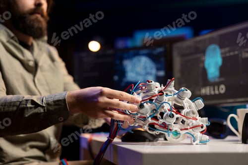 Preview: Close up shot of EEG headset used by programmer to upload his mind online