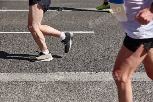 Preview: Runners on the street. Healthy lifestyle. Jogging exercise. Athletics