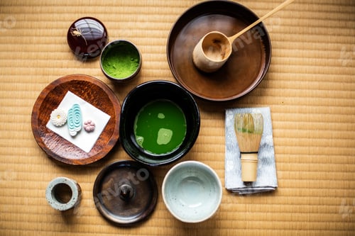 Preview: Tea ceremony utensils including bowl of green Matcha tea, a bamboo whisk and Wagashi sweets.