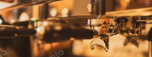 Preview: Professional brewing, Espresso coffee pouring from espresso machine. Barista details in cafe